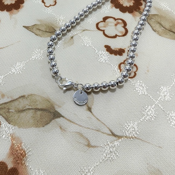 Tiffany & Co. Silver And Green Heart Bracelet - Picture 5 of 7